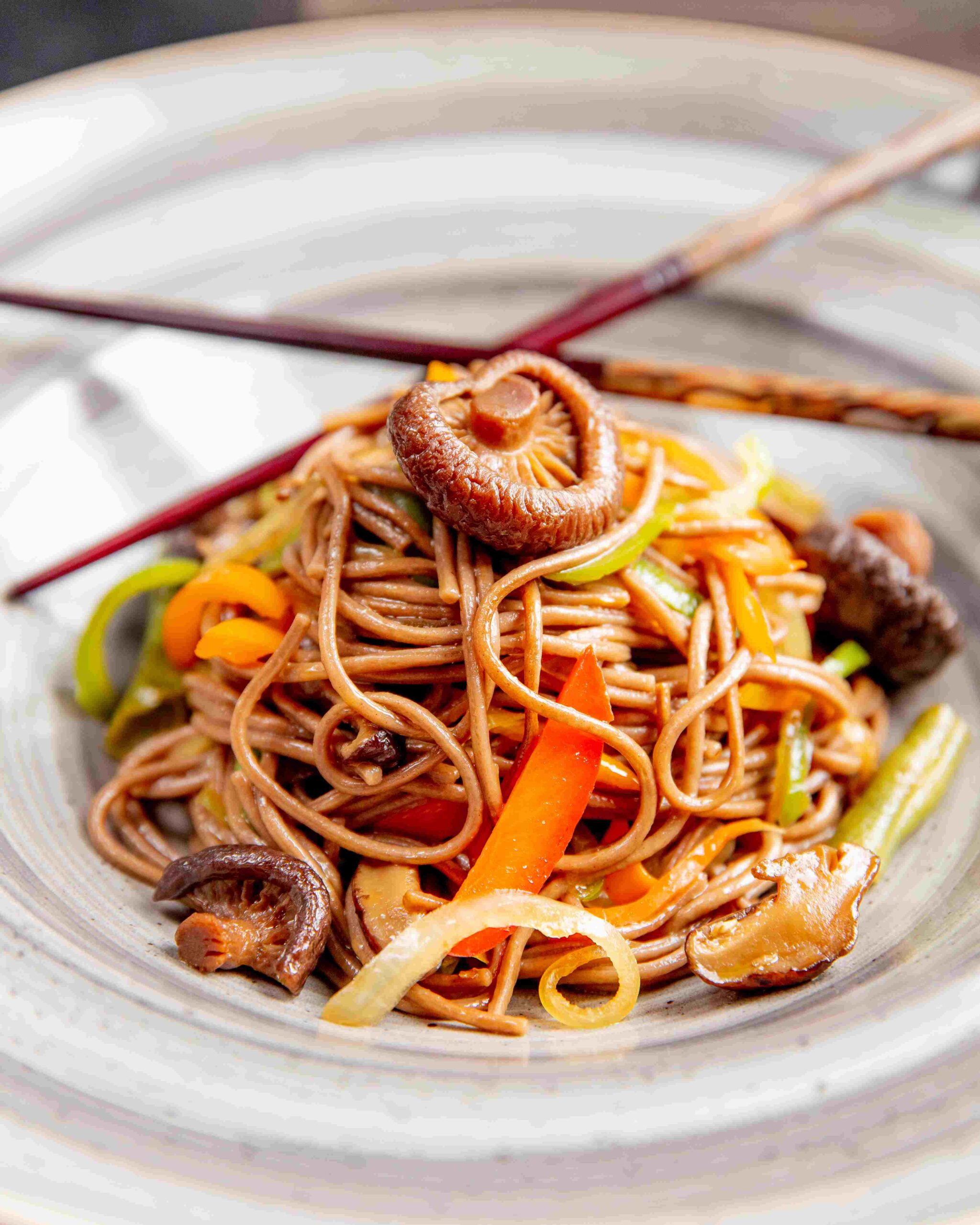 noodles-prepared-with-mushrooms-bell-peppers-sauce